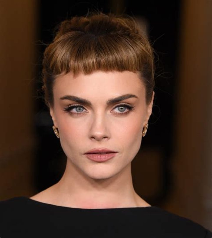 Cara Delevingne with a cut on eyebrow style