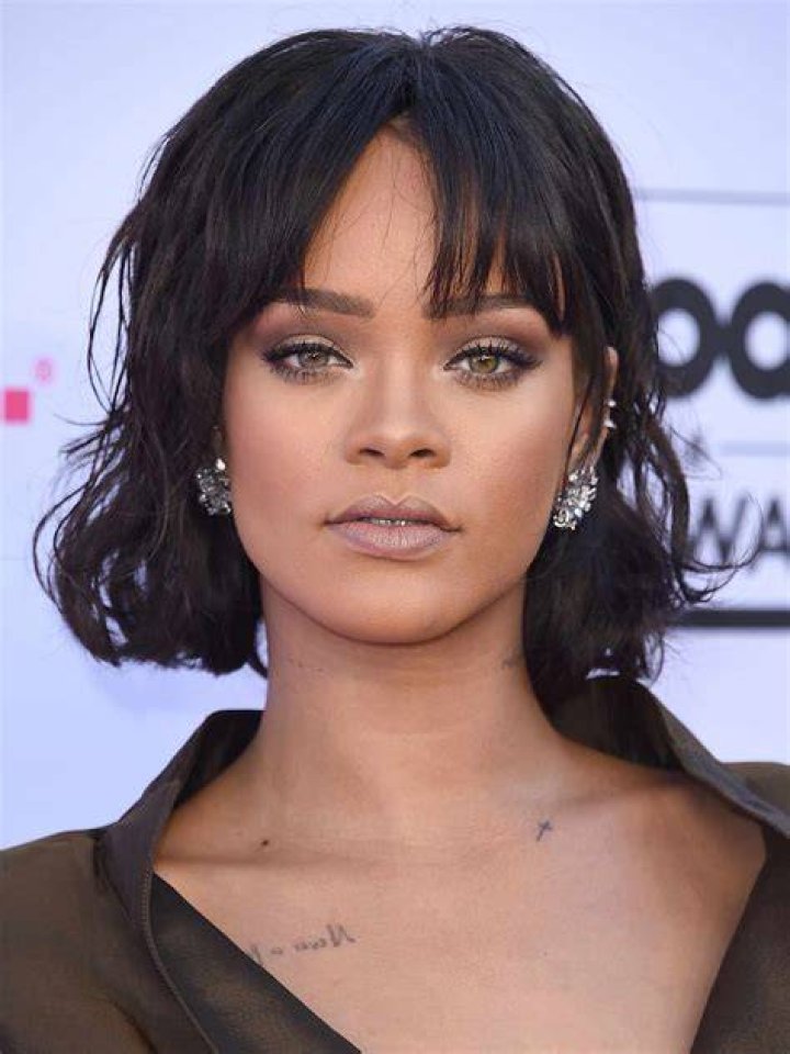 Rihanna with a cut on eyebrow style